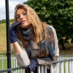 Women’s Touchscreen Velour-Lined Faux Suede Gloves With Dogtooth Print -Dents Luxury Accessories Sales woman wearing navy houndstooth gloves