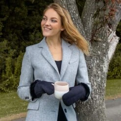 Women's Sheepskin Mittens -Dents Luxury Accessories Sales woman wearing navy sheepskin mittens