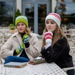 Women’s Knitted Beanie Hat With Contrasting Stripes -Dents Luxury Accessories Sales womanwearingknittedstripehatinwhite